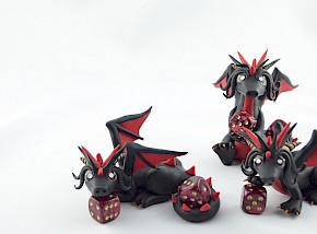 black and red dice dragons