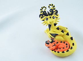 yellow mama dragon with babie