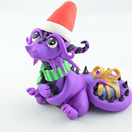 Christmas dragon with gift