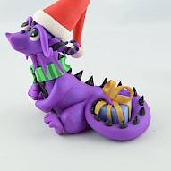 Christmas dragon with gift