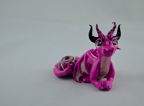 pink dragon with a  gem